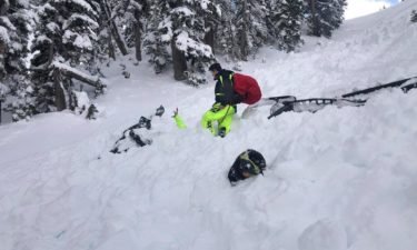 Snowmobiler's get caught in avalanche