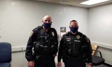 Officers wearing face masks