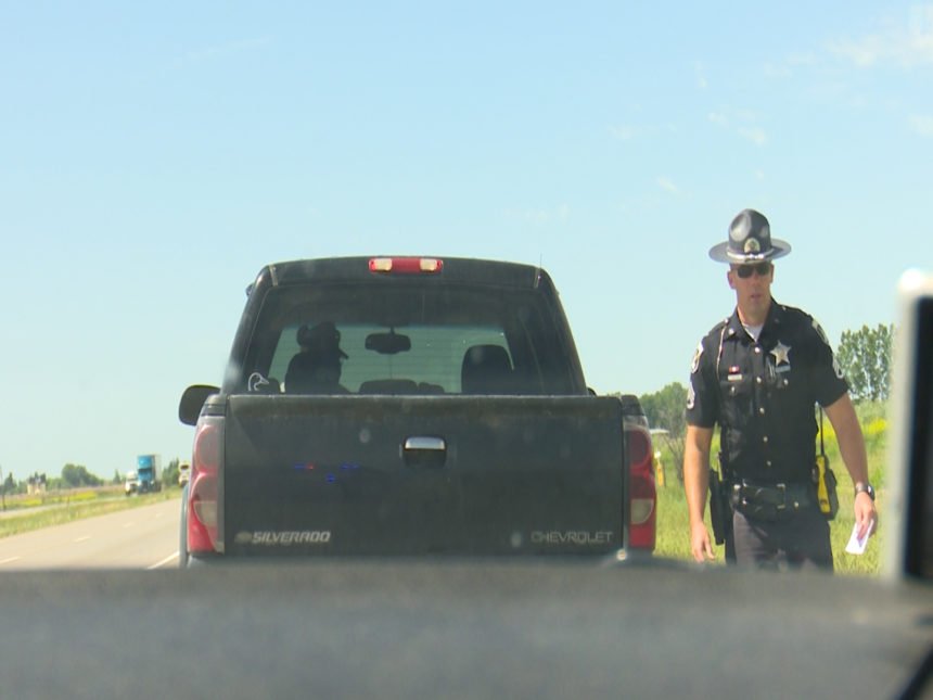 ISP trooper giving a ticket