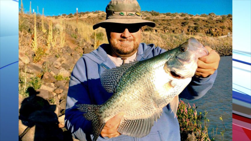 Jon-Urban-shows-off-a-17-inch-Black-Crappie-that-landed-him-a-new-catchrelease-record