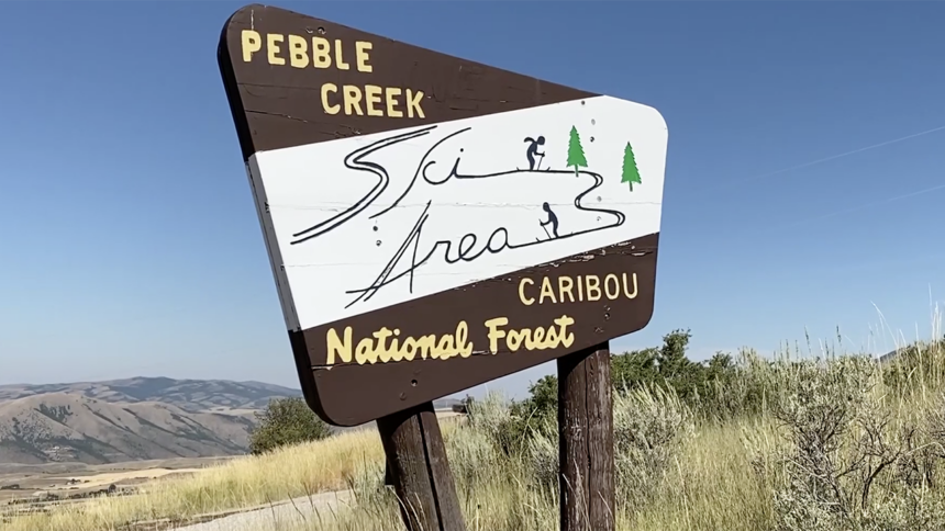 Pebble Creek Ski Area sign logo