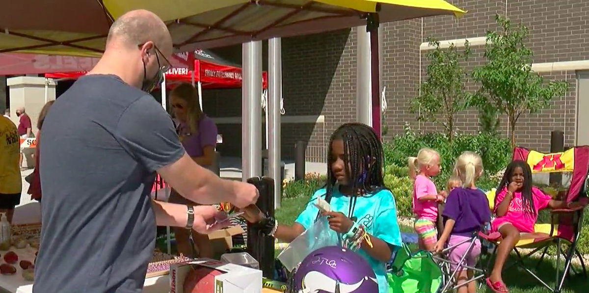 Kamryn (right) and her friends have raised more than $130,000 selling bracelets to help heal the Minneapolis community following months of protests in the city.