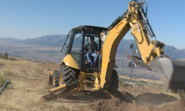 General Manager Mike Dixon operating machinery during renovations