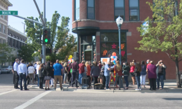 People gather outside of United Way of Southeastern Idaho for Thursday's ribbon-cutting ceremony