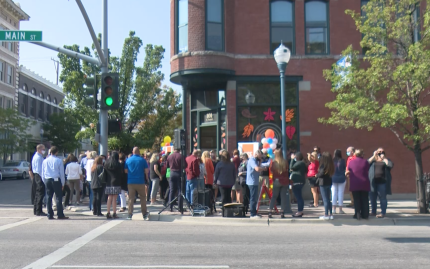 People gather outside of United Way of Southeastern Idaho for Thursday's ribbon-cutting ceremony