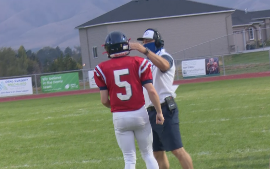 #5 QB Zach Park talks with Head Coach David Spillet during game against Idaho Falls on Sept. 25