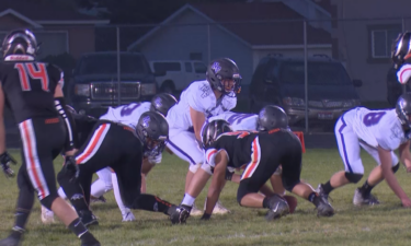 #13 QB Luke Hill lines up under center in North Fremont's 22-14 win over Aberdeen