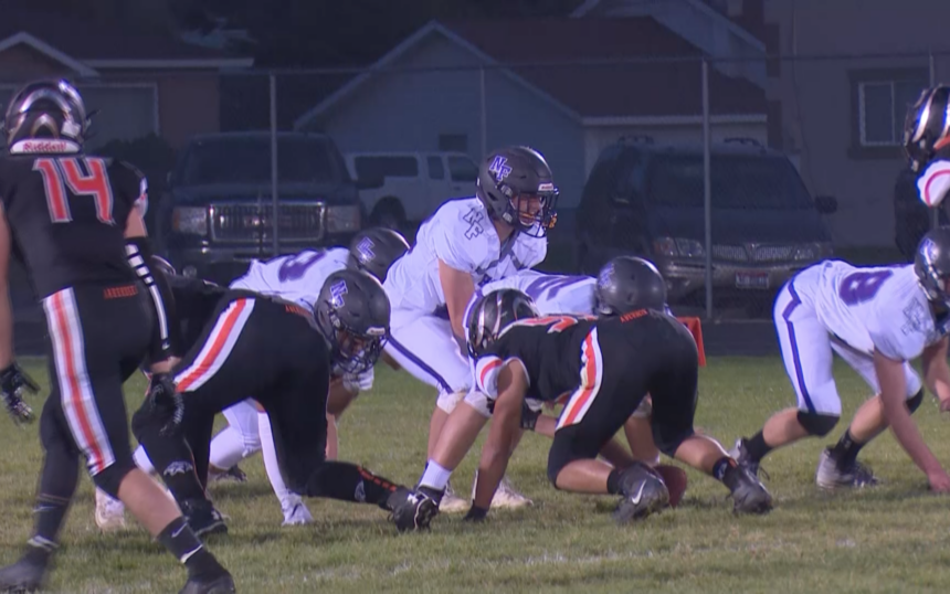#13 QB Luke Hill lines up under center in North Fremont's 22-14 win over Aberdeen