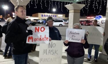 Protestors gather outside of Pocatello City Hall during Thursday's council meeting