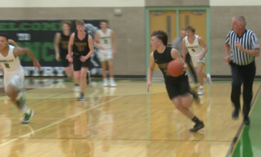 #3 Kade DaBell dribbles in transition in Rigby's 56-49 win over Blackfoot