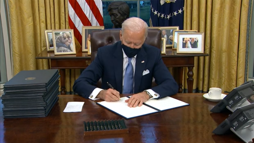 Biden signs executive orders on climate, virus