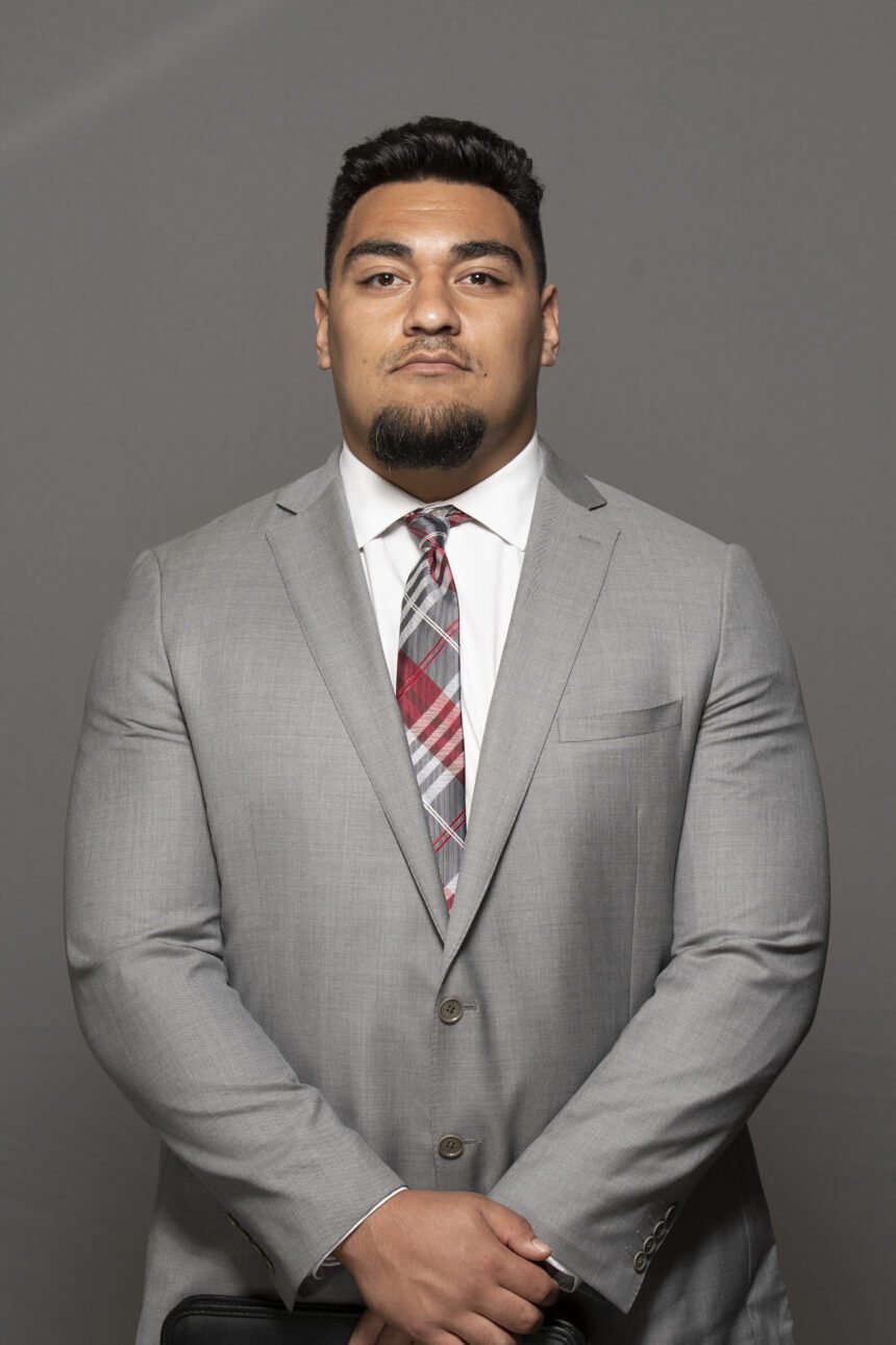 Coat and tie headshots of the football team on June 14, 2019.
