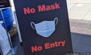 No mask, no entry' sign