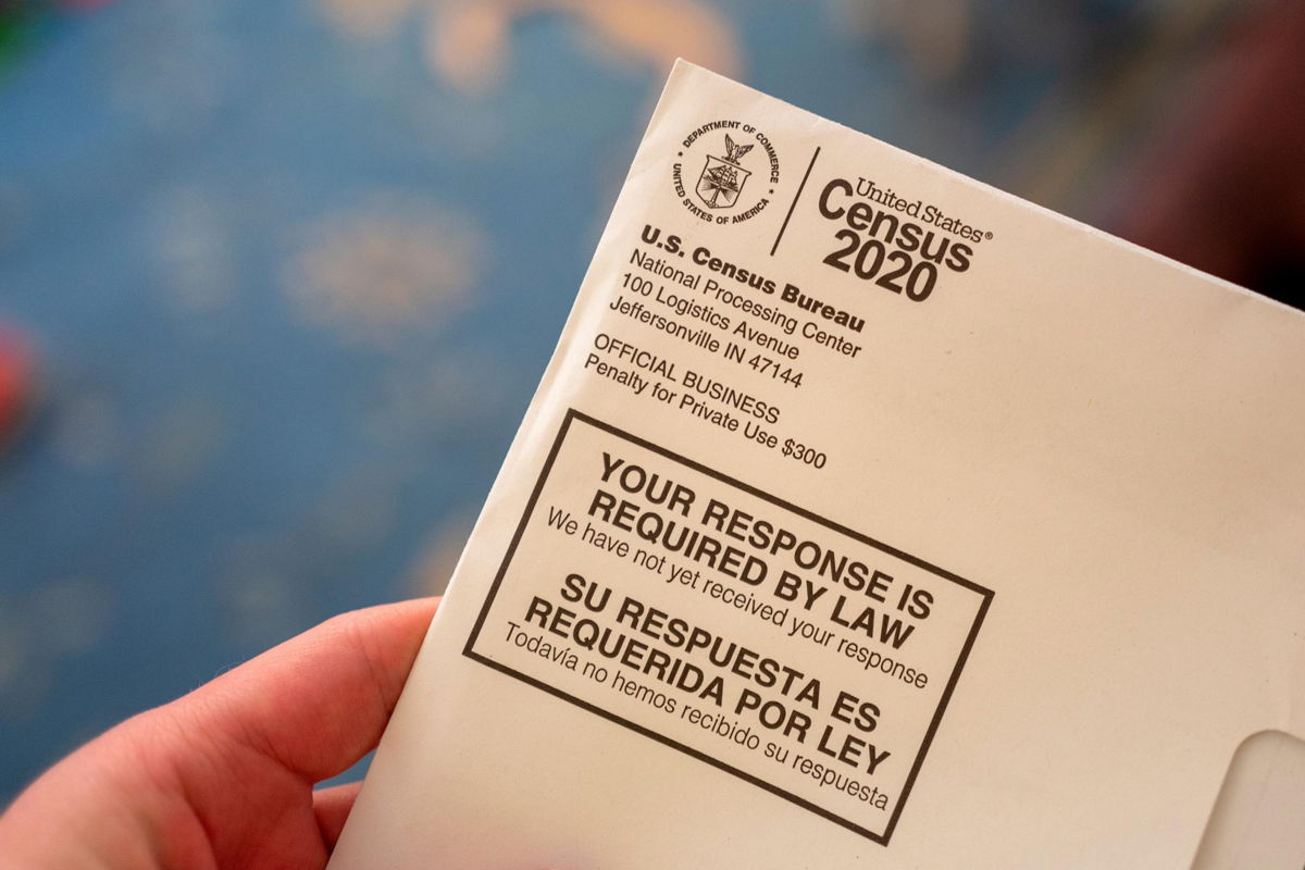 Close-up of human hand holding a letter from the Census Bureau regarding the 2020 Census, San Ramon, California, April 24, 2020. (Photo by Smith Collection/Gado/Sipa USA)(Sipa via AP Images)