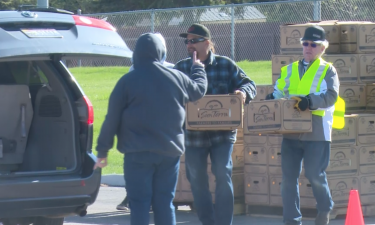 Members of Calvary Church in Pocatello hand out food boxes