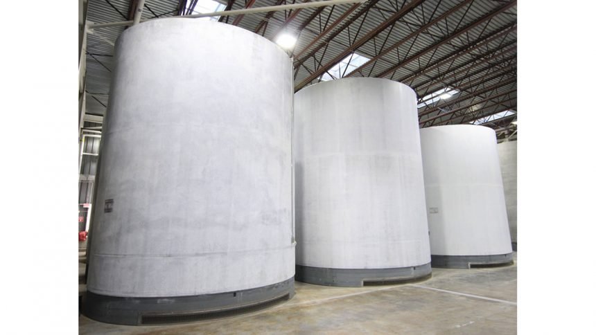 The Naval Nuclear Propulsion Program stores naval spent nuclear fuel in concrete overpacks at the Naval Reactors Facility on the Idaho National Laboratory.