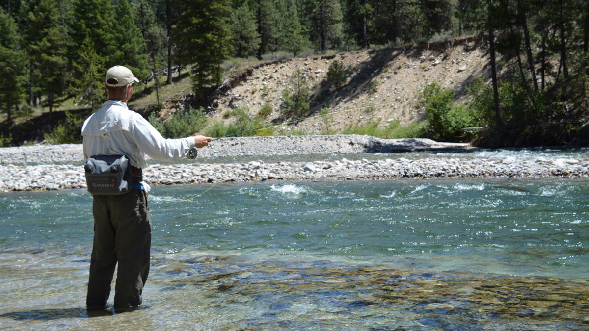 Trout angler fishing South Fork Payette River, Southwest Region.