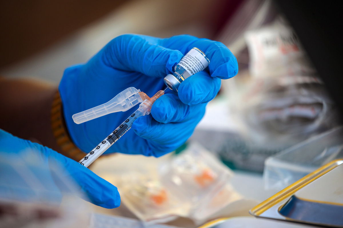 <i>Irfan Khan/Los Angeles Times/Getty Images</i><br/>Los Angeles-based non-profit Mothers In Action hosts a mobile Covid-19 vaccine clinic in collaboration L.A. County Department of Public Health on July 16.