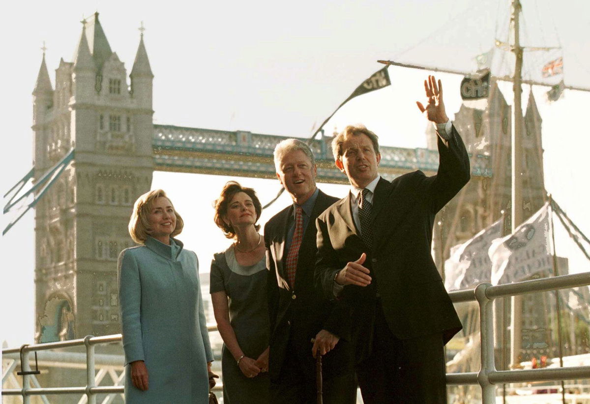 <i>Greg Gibson/AP</i><br/>US President Bill Clinton and his wife Hillary pose in front of London's Tower Bridge with British Prime Minister Tony Blair his wife Cherie