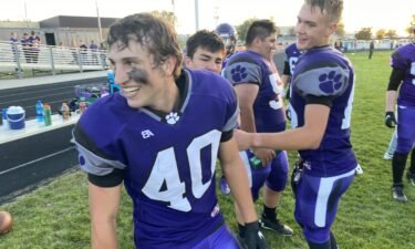 #40 RB Zach Stailey and #QB 16 Cole Gilbert celebrate in Snake River's 57-40 win