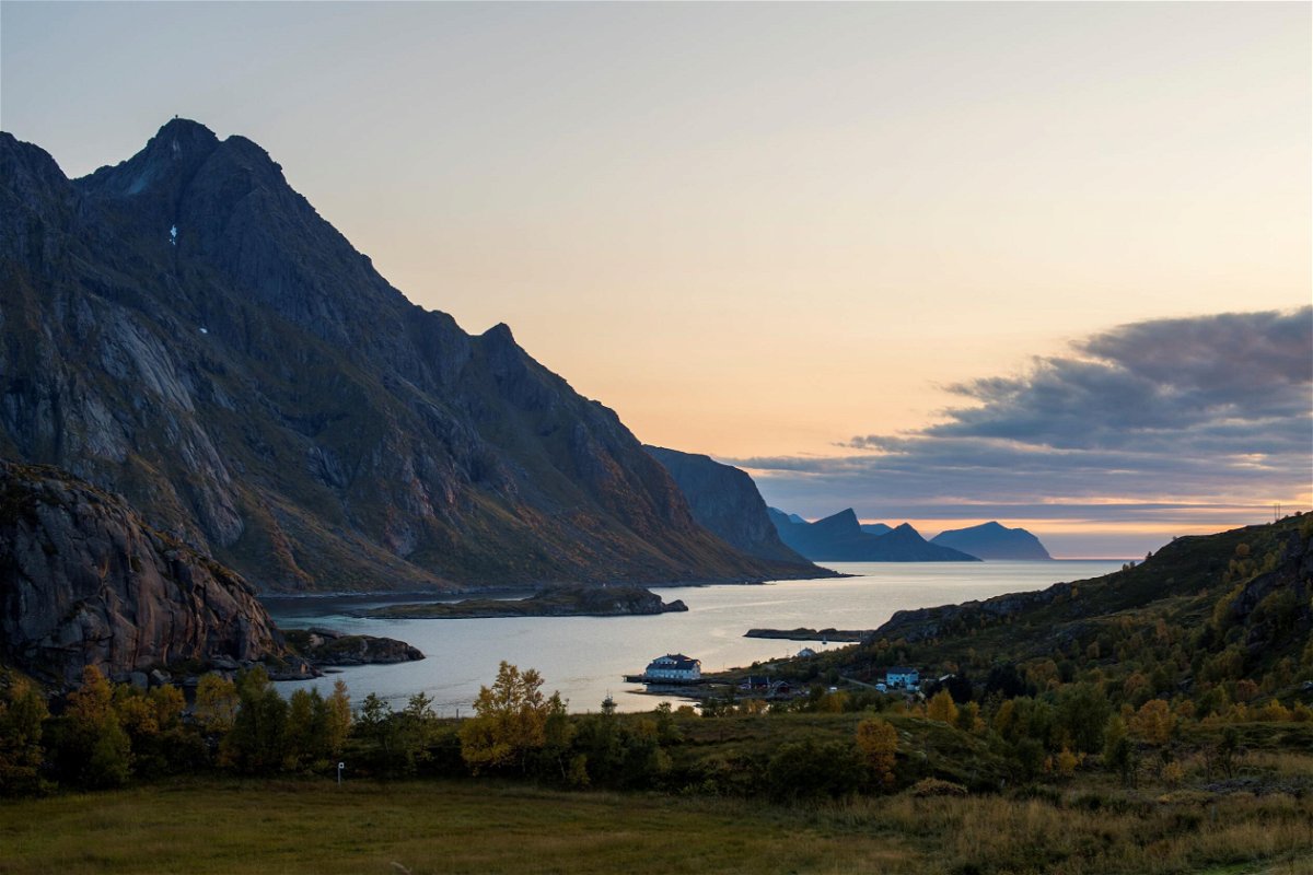 <i>Olivier Morin/AFP via Getty Images</i><br/>Norway moves into the 'very high' risk category for travel. The sun sets in Tangstad fjord
