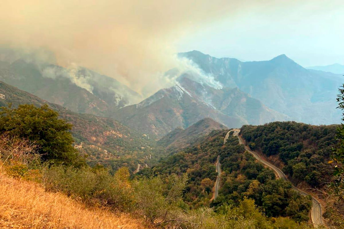 <i>KNP Complex Fire Incident Command/AP</i><br/>A pair of wildfires burning in California's parched Sierra Nevada mountains