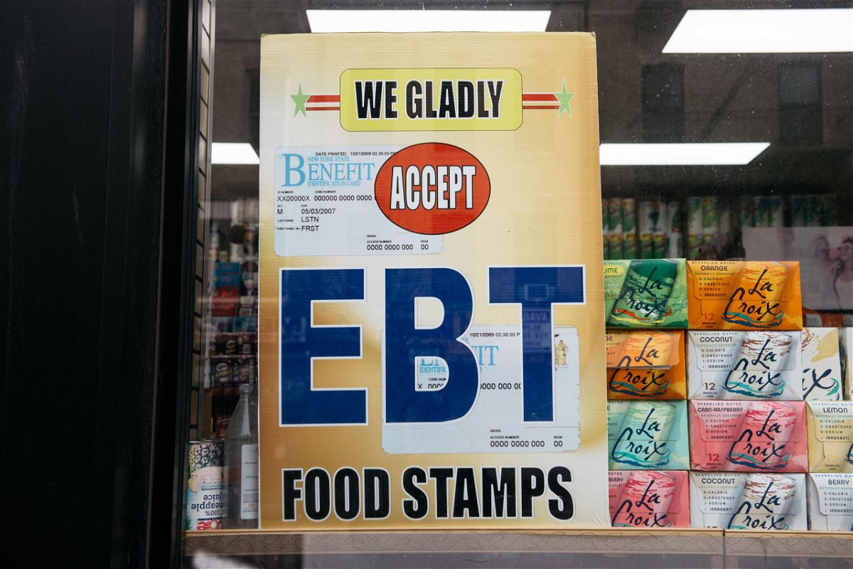 <i>Scott Heins/Getty Images</i><br/>A historic increase in food stamp benefits starts in October. A sign alerting customers about food stamps benefits is displayed at a Brooklyn grocery store on December 5