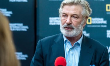 A source close to Alec Baldwin tells CNN that the actor has not been formally asked by the Santa Fe County Sheriff's Office to return to New Mexico for in-person questioning regarding the investigation into last month's fatal shooting on the set of the film "Rust."