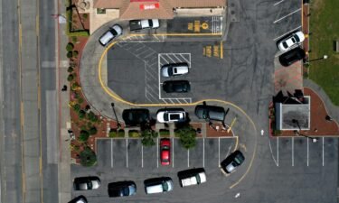 Cars line up at a McDonald's drive-thru on April 22