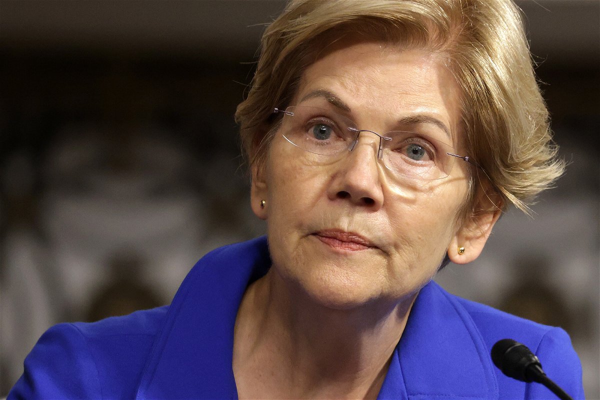 <i>Alex Wong/Getty Images</i><br/>Democratic Senator Elizabeth Warren wants federal regulators to investigate whether any laws were broken by the shell company that is facilitating former President Donald Trump's return to Wall Street. Warren is shown here on September 28