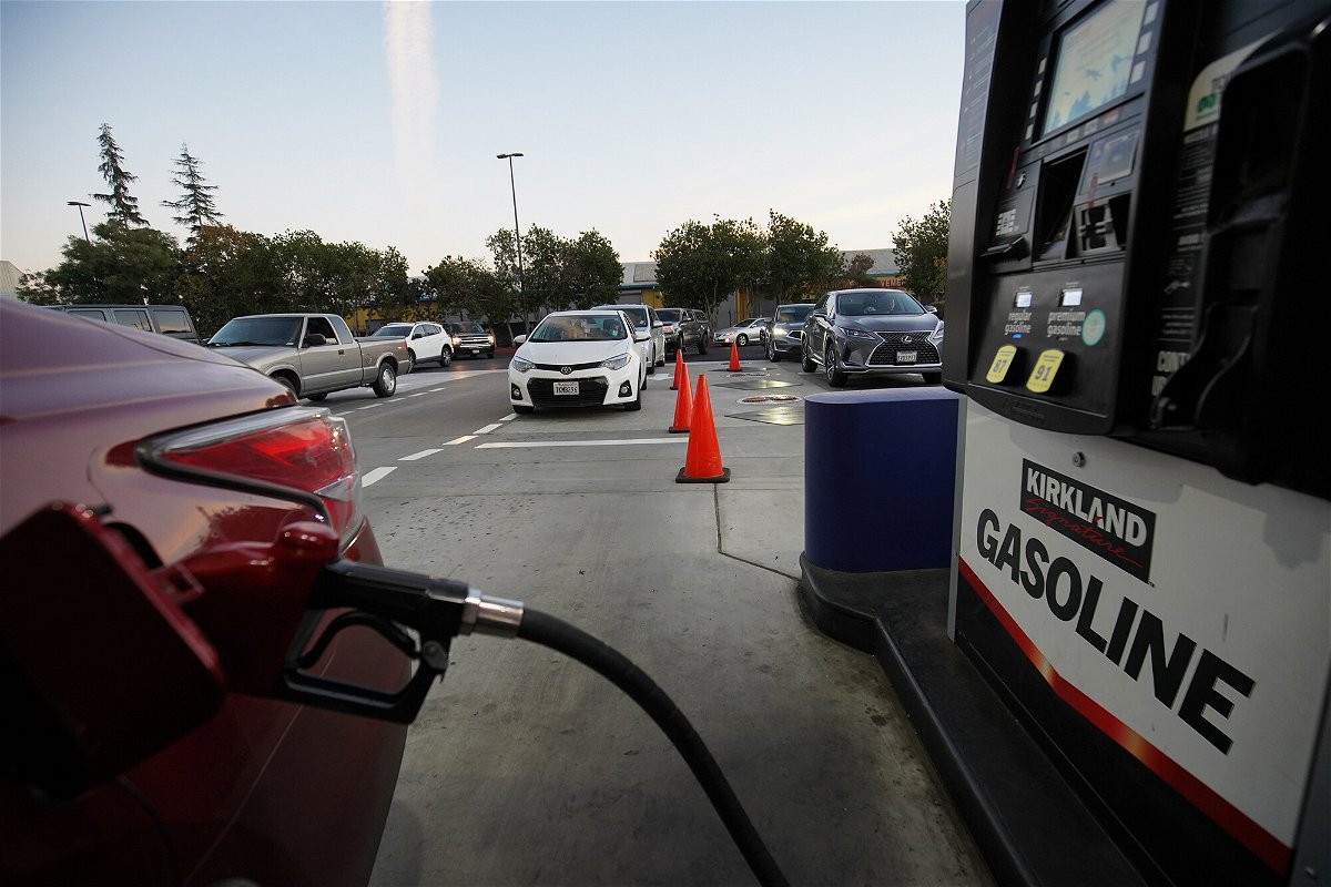 <i>Michael Ho Wai Lee/SOPA Images/LightRocket/Getty Images</i><br/>A driver pumps gas at a gas station of Costco in San Leandro