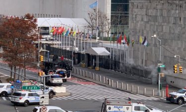 Police patrol cars outside the United Nations headquarters in New York on December 2