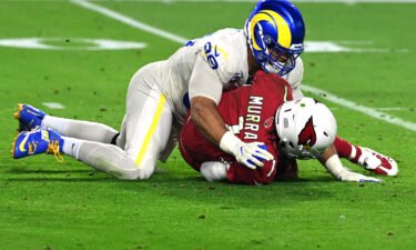 Aaron Donald sacks Murray in the second quarter of the game at State Farm Stadium on December 13.