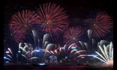 Fireworks explode over Victoria Harbor during New Year celebrations in Hong Kong on January 1