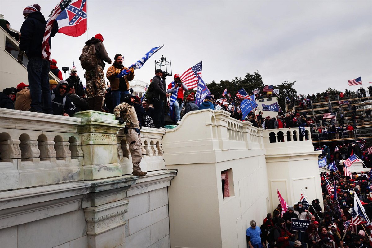 <i>Spencer Platt/Getty Images</i><br/>Supporters of then-President Donald Trump storm the US Capitol building following a 
