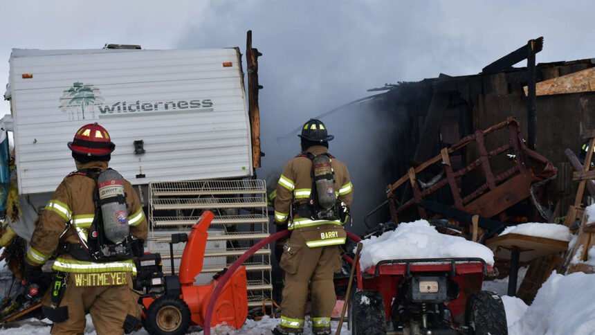 Camper a complete loss, barn damaged in fire_IFFD_1