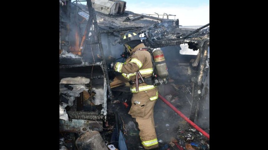 Camper a complete loss, barn damaged in fire_IFFD_2