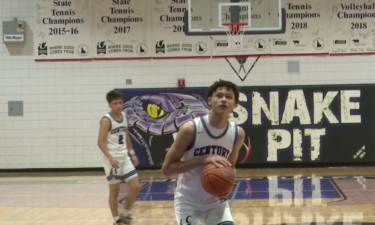 Isiah Harwell shoots free throw in Century's 57-44 win