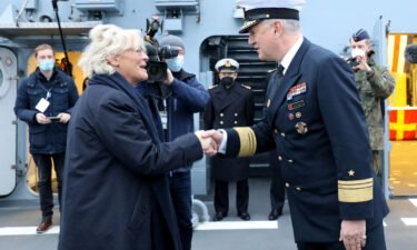 German navy chief Kay-Achim Schönbach resigns after suggesting Putin 'deserved respect.' Schönbach here greets German Defense Minister Christine Lambrecht onboard the corvette "Oldenburg" on December 17