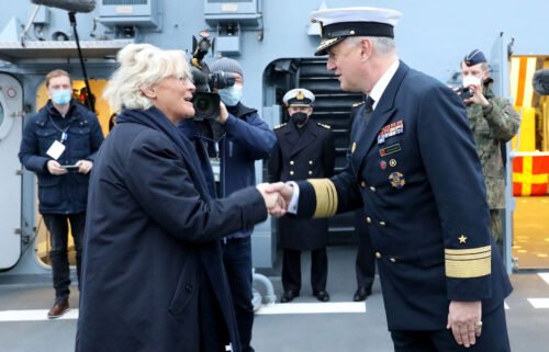 German navy chief Kay-Achim Schönbach resigns after suggesting Putin 'deserved respect.' Schönbach here greets German Defense Minister Christine Lambrecht onboard the corvette "Oldenburg" on December 17