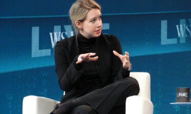 Holmes speaking at a Wall Street Journal technology conference in Laguna Beach