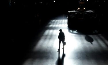A commuter walks through Grand Central Terminal amid the coronavirus pandemic in New York City