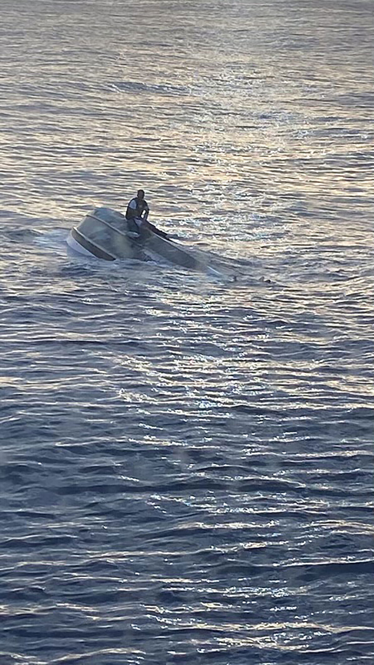 <i>US Coast Guard</i><br/>The US Coast Guard said a man was rescued from a capsized boat by a good Samaritan.