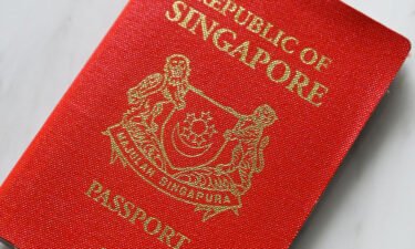 A photo illustration shows a Singapore passport in Singapore on March 29