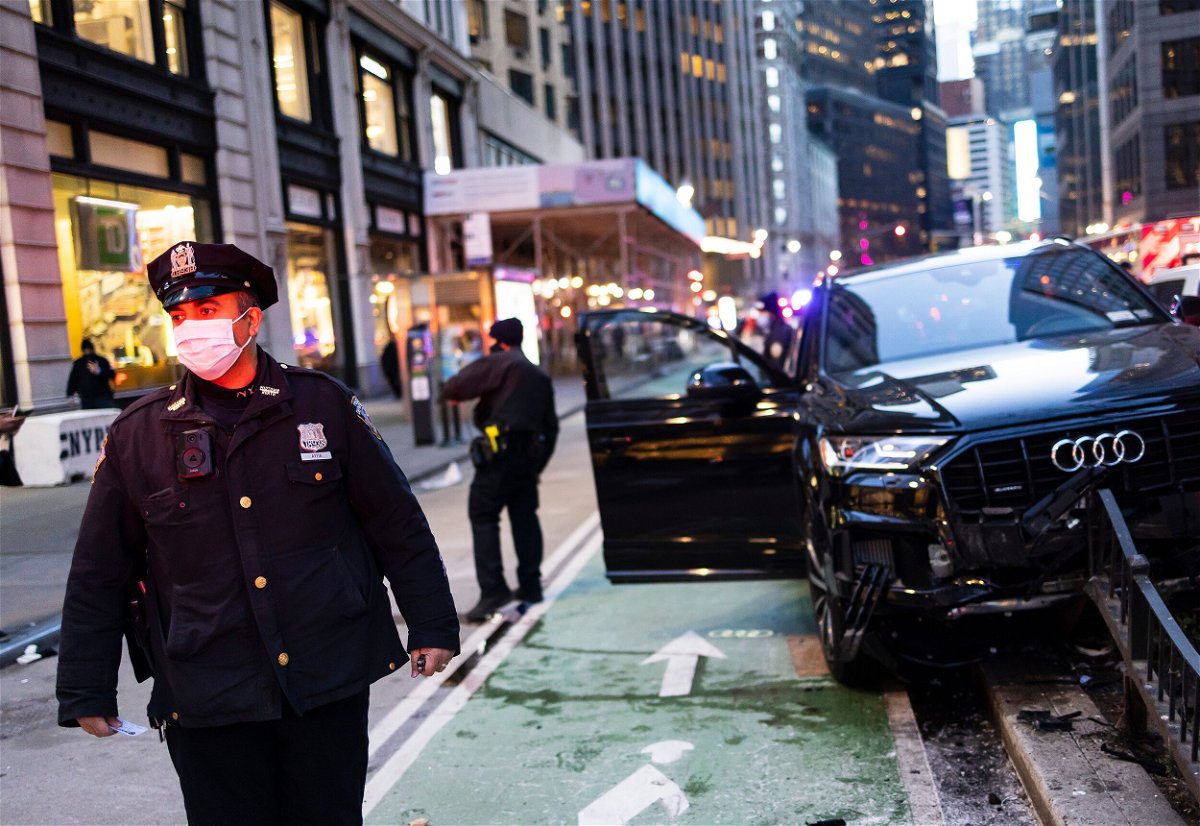 <i>Justin Lane/EPA-EFE/Shutterstock</i><br/>The NYPD at the scene of a suspected carjacking just north of Times Square on January 12. The number of carjackings quadrupled in New York City over the last four years.