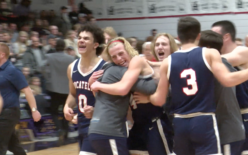 Kesler Vaughan celebrates with teammates in Pocatello's 64-62 win over Century