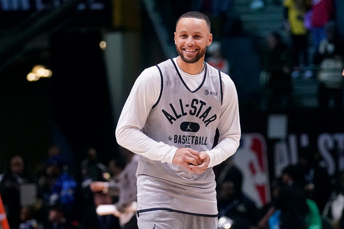 <i>Charles Krupa/AP</i><br/>Stephen Curry smiles during a practice session in Cleveland