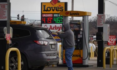 Gas prices are displayed on a sign at a gas station on March 3 in Hampshire