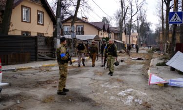 Irpin Mayor Oleksandr Markushin leads one of the special force units looking for Russian infiltrators still present in the town.