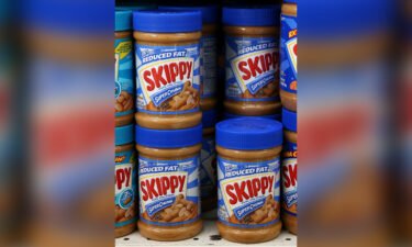 Jars of Skippy peanut butter are displayed on a shelf at a store in San Rafael